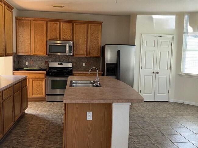 Foto del edificio - 1124 Winding Creek Pl