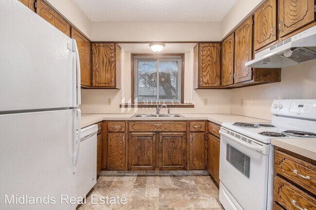 Building Photo - 3 br, 2 bath House - 8410 S 142nd Avenue