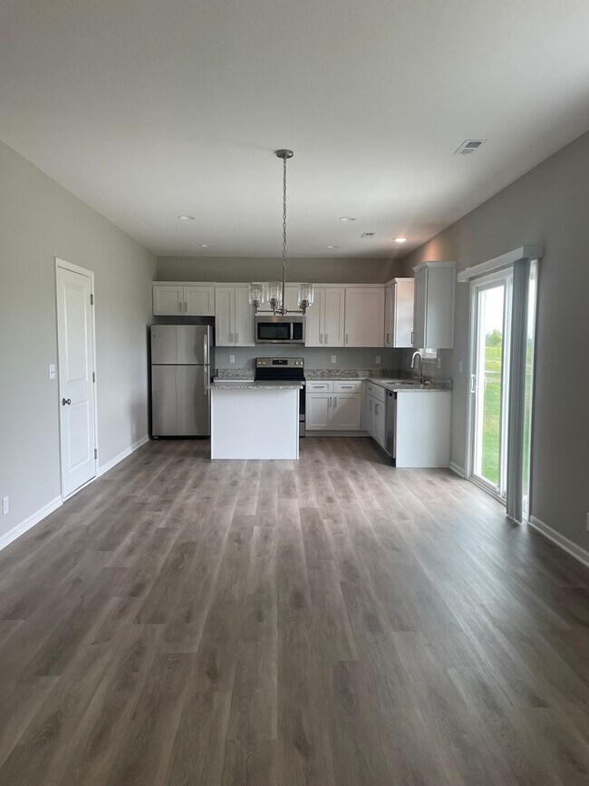 Building Photo - 4 bedroom available in Blue Springs! Coming Soon!