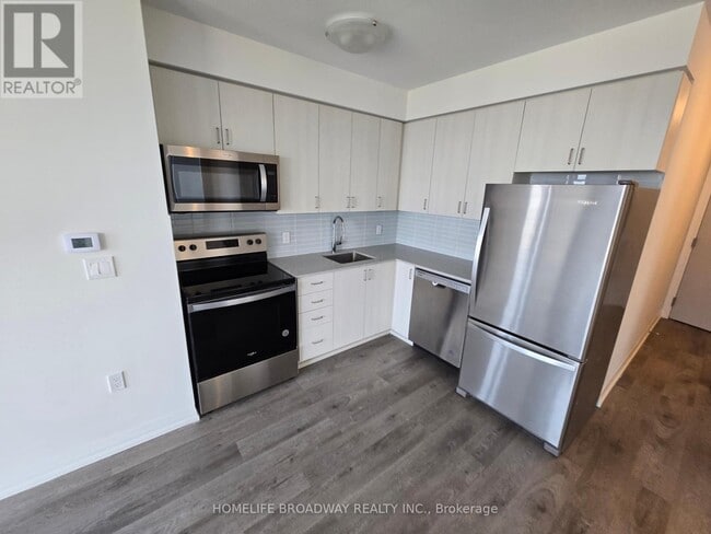 Photo du bâtiment - 325-P325 Yorkland Blvd