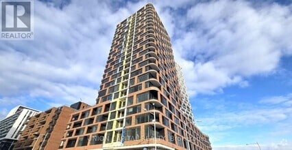 Building Photo - 38-1638 Andre de Grasse St