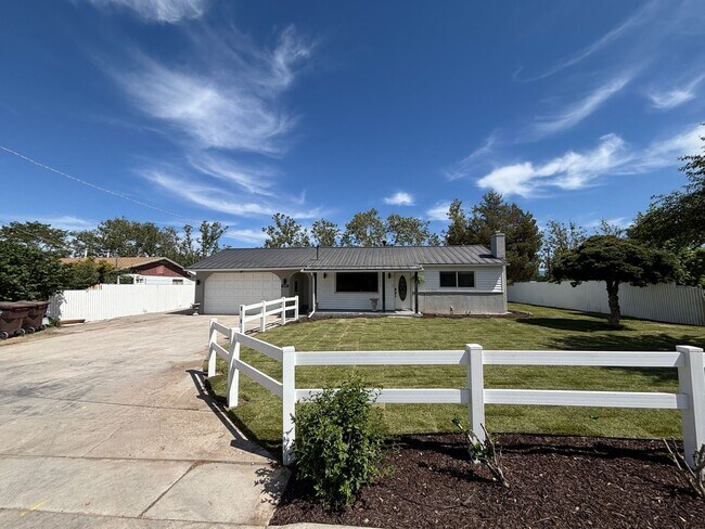 Building Photo - Beautifully Renovated 4-Bedroom Home with Finished Basement