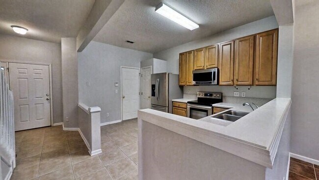 Building Photo - 7518 Scarlet Ibis Ln