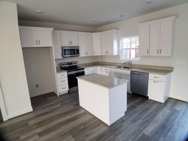 Foto del edificio - Modern & Bright 3-Bed End-Unit Townhome in...
