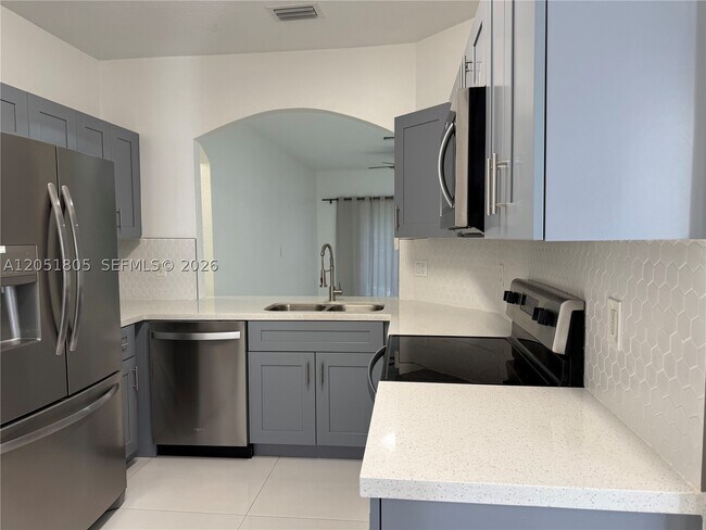 Building Photo - 5670 NW 116th Ave