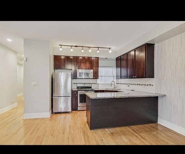 Foto del edificio - 4529 S Prairie Ave
