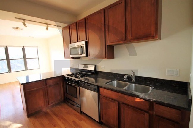 Foto del edificio - 3238 W Leland Ave