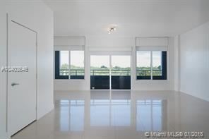 Building Photo - 1 br, 2 bath  - 3250 Grand Ave Ste 504