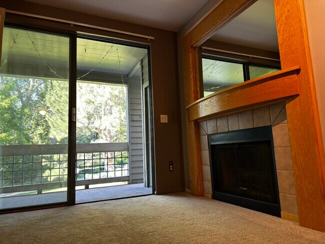 LIVING ROOM BALCONY & GAS FIREPLACE - 3260 47th St