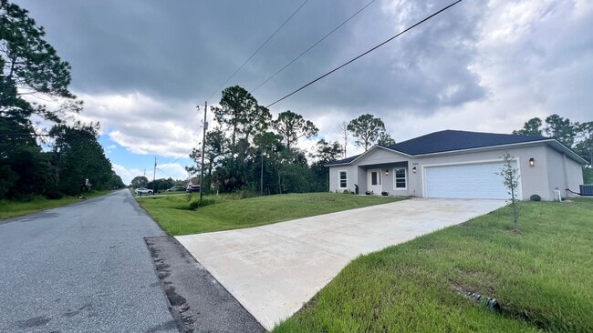 Building Photo - WONDERFUL 4 BD/2BA Home in Beautiful Palm ...