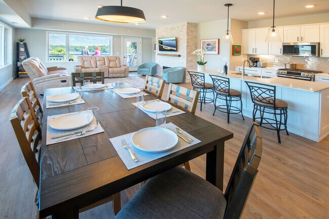 Dining area with extra seating at the kitchen island - 225 E Seventeenth St