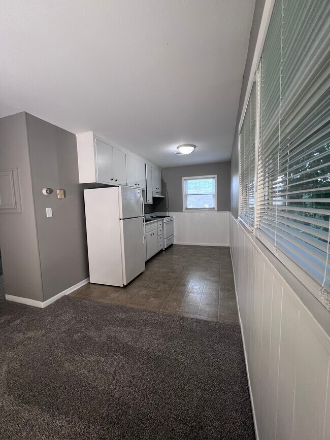 Bright Galley Kitchen with lots of storage. - 208 3rd Ave SW