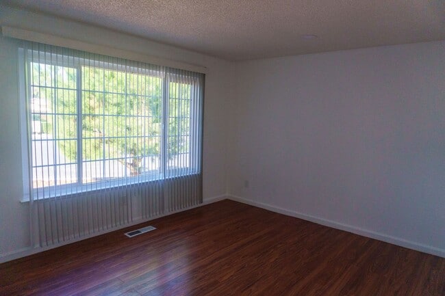 Building Photo - Spacious Three Bedroom, Two Bathroom House featuring Two Car Garage With Huge Yard