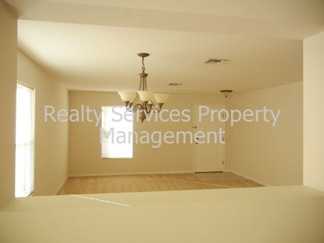 Building Photo - 3 CAR GARAGE...4 BEDROOM , GATED  COMMUNITY