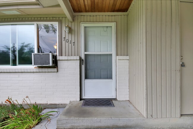 Front door, screen gone. - 7017 Sacramento St SW