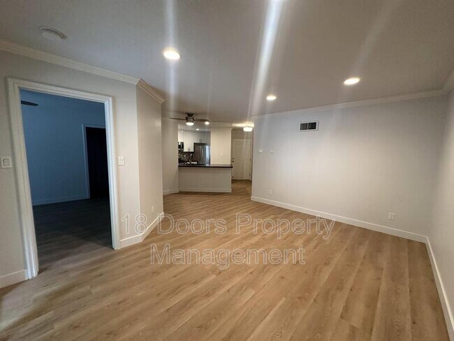 Building Photo - 7565 Charmant Drive Unit 411