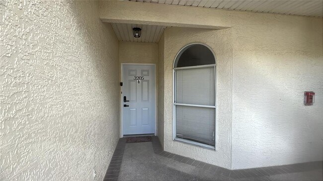 Building Photo - 3205 Sabal Palms Ct