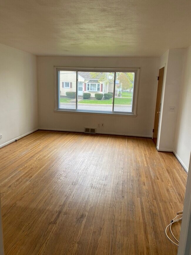 front window of living room - 404 W Hickory St
