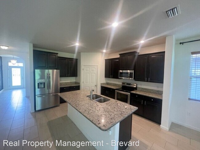 Building Photo - 5 br, 2.5 bath House - 4318 Alligator Flag...