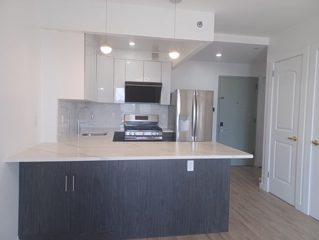 Kitchen - 7065 Queens Blvd