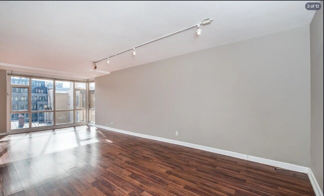 Foto del edificio - Bright fifth-floor one-bedroom in the heart of Dupont Circle with floor-to-ceiling windows and an...
