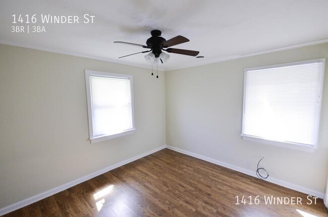 Building Photo - RENOVATED 3 Bed, 3 Bath with 2 Car Enclose...