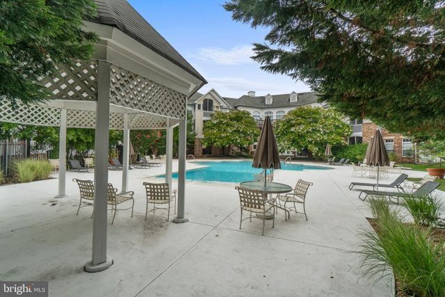 The property amenities include access to a private community pool for use by residents. - 6714 Village Park Dr