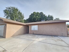 Building Photo - 4417 W 16th Ln