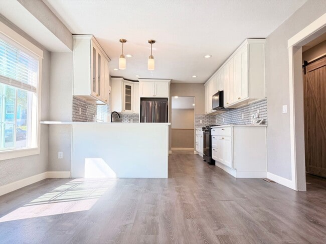 Photo - Lovingly Updated Home with Separate Garage, Outdoor Cat Enclosure, Finished Basement, Large Yard,...