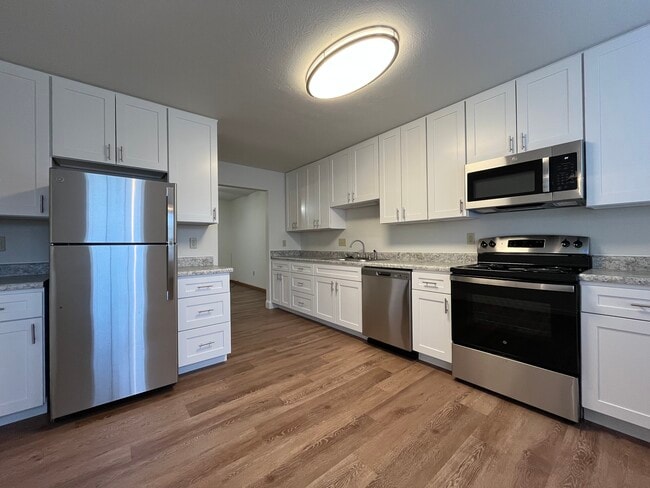 White Kitchen 2BD TH - Holiday Park Apartments and Townhomes