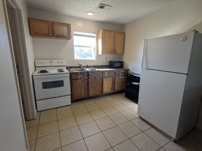 Building Photo - 6213-6215 Commodore Dr