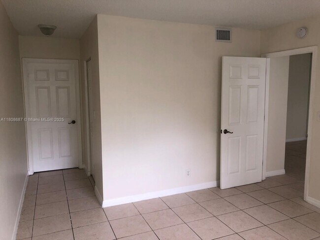 Building Photo - 11213 Royal Palm Blvd