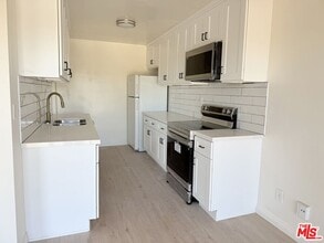 Building Photo - 10200 De Soto Ave