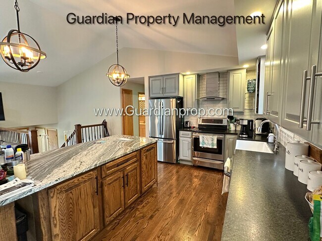 Building Photo - Maple Grove Single Family Home, Fenced Yard, 3 Car Garage, Deck, Available 7-31