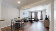 Located in Aurora, Colorado, this 1-bedroom, 1-bathroom unit offers a thoughtfully designed single-floor layout that maximizes functionality and comfort. The open-concept living and dining area is immediately welcoming, featuring rich hardwood-style flooring, crown molding, and a neutral color palette that creates a bright, cohesive atmosphere. Large windows allow natural light to fill the space, with views to the outside adding a sense of openness. The living room comfortably accommodates a full seating arrangement and flows seamlessly into the dining area, making it ideal for everyday living and entertaining.

The kitchen is positioned adjacent to the dining space and features light wood cabinetry, stone-look countertops, and stainless steel appliances including a range and over-the-range microwave. A peninsula with a sink provides additional prep space and a natural separation between the kitchen and living areas.

The bedroom offers a cozy, carpeted retreat with a ceiling fan, a dedicated closet, and a window dressed with bold patterned curtains. The full bathroom is clean and functional, featuring a wood-toned vanity, a shower-tub combination, and hardwood-style flooring. A closet near the entry provides additional storage, rounding out this efficient and comfortable home.