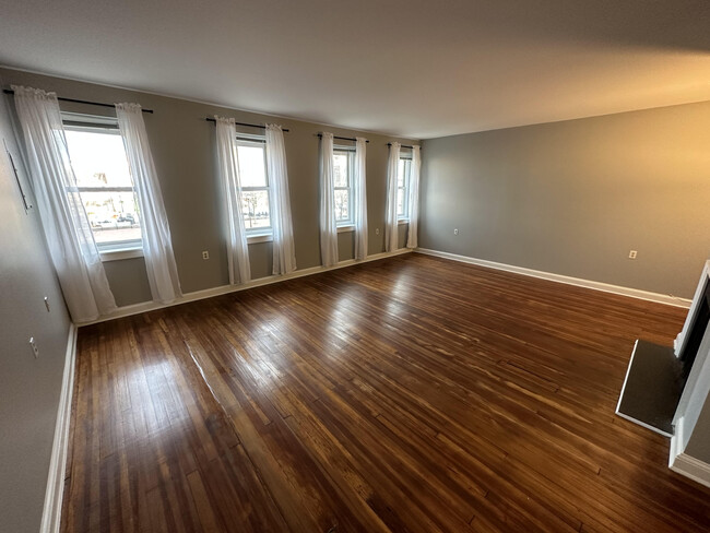 Great Room With Fireplace (Hardwood)and Stunning Views of Fells Point - 802 S Broadway