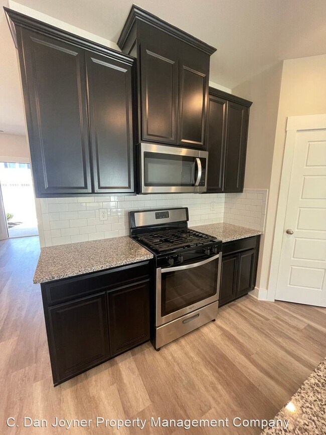Foto del edificio - 3 br, 2.5 bath House - 406 Windsinger Lane