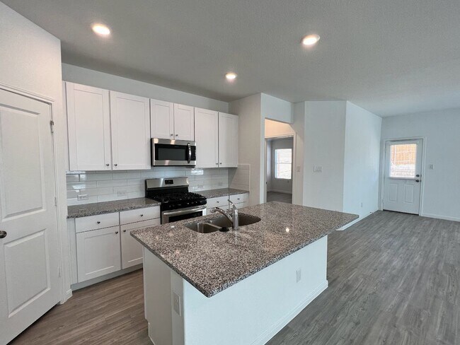 Building Photo - Spacious 4-Bedroom, 3-Bath Energy-Efficien...