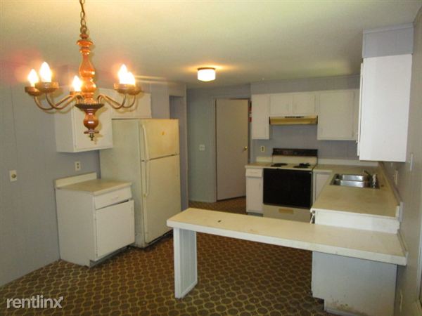 Building Photo - 8473 Woolfit Ave