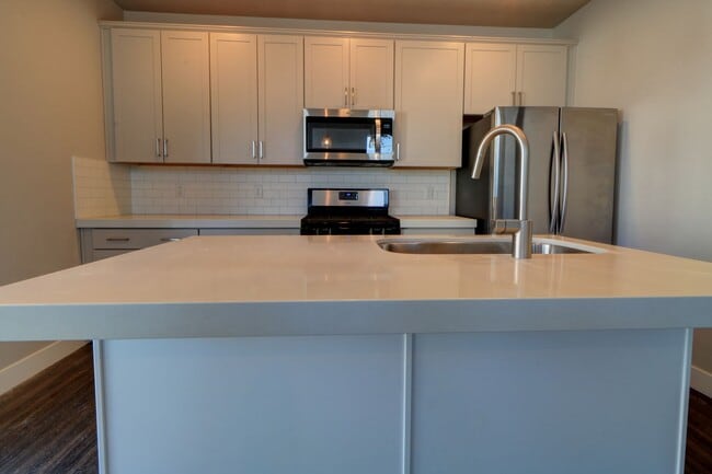 Building Photo - End Unit With Finished Basement