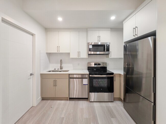 Building Photo - 7412-7434 34 Ave NW
