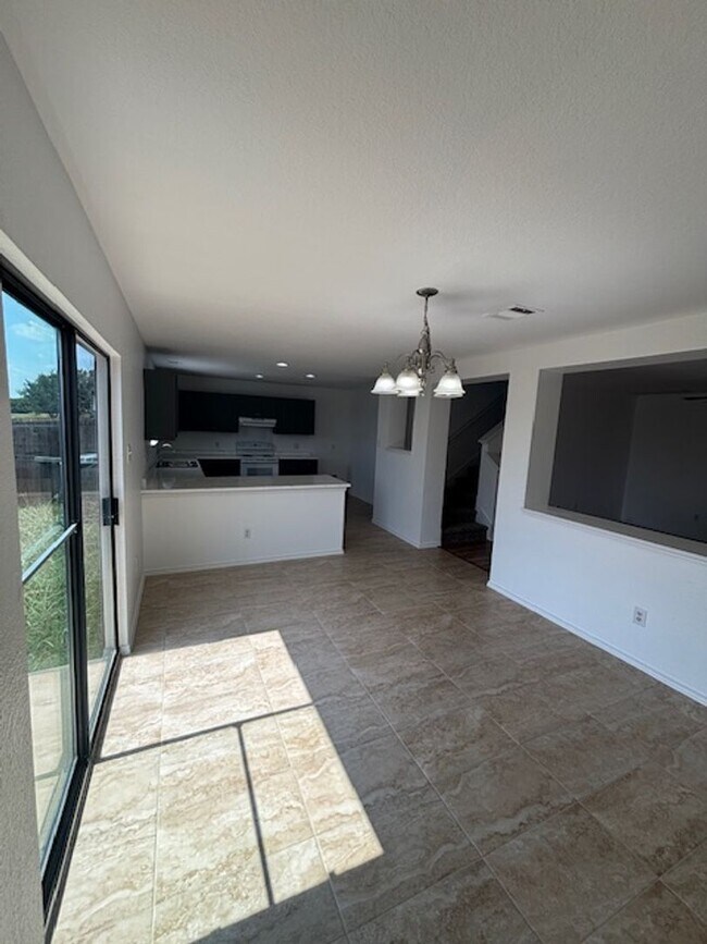 Building Photo - Move-In Ready 4-Bedroom Home with New Floo...