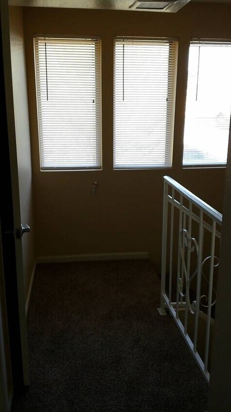Hallway with 3 daylight windows - 2544 W Campbell Ave