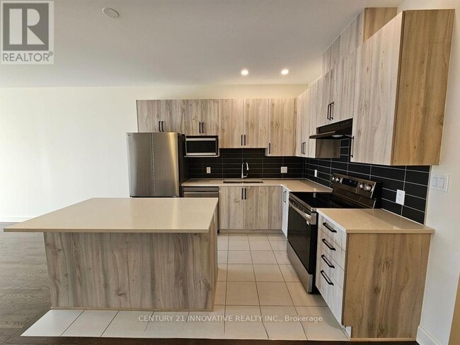 Photo du bâtiment - 1307 Demers Ave