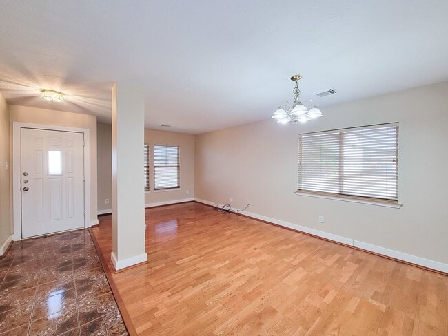 Building Photo - 3 bedroom one story home on large corner lot. Home has hard flooring throughout living areas and ...