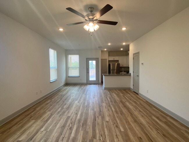 Building Photo - Spacious Three-Bedroom Duplex in Gated Community @ Cinco Lakes