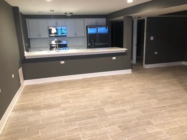 LIVING ROOM W OPEN KITCHEN UNFURNISHED VIEW - 4836 S Michigan Ave