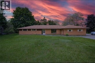 Building Photo - 830 Riverbank Dr