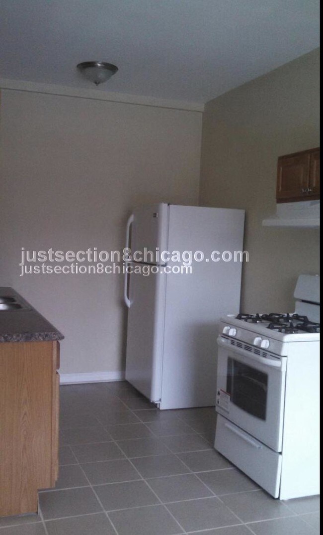Foto del edificio - 7051 S Bennett Ave