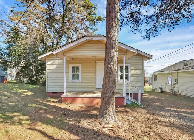 Building Photo - Welcome to your charming new home in the h...